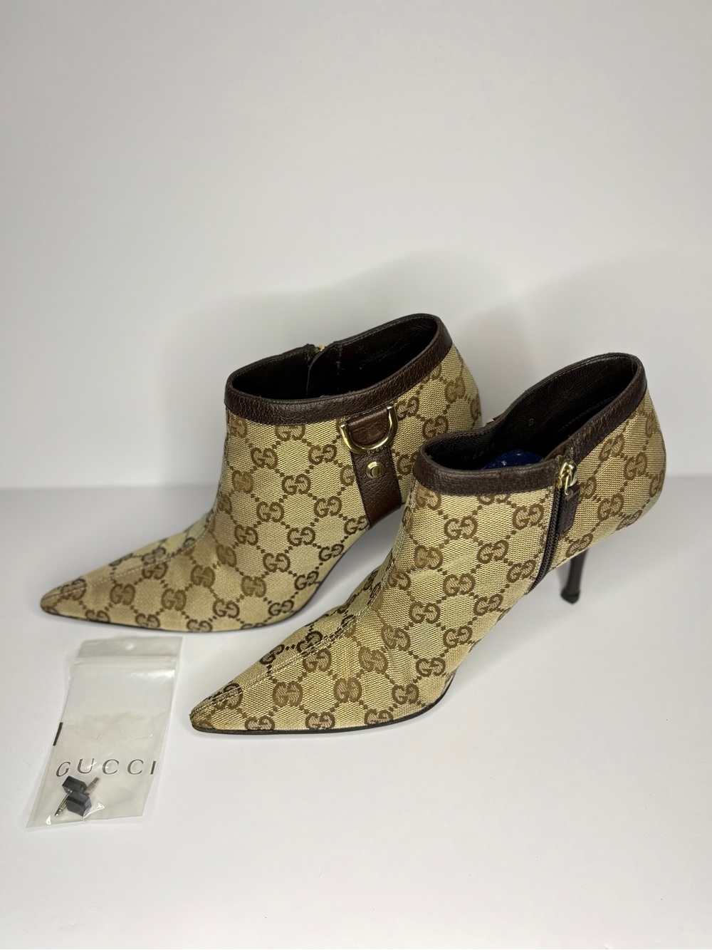 Gucci Beige GG Monogram Pointed Toe Ankle Booties with Brown Trim